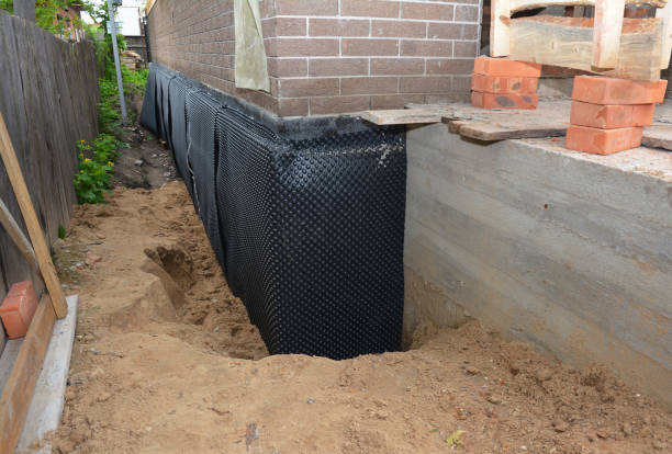 Happy homeowners after waterproofing job in North Vernon